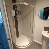Corner shower installation