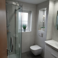 Grey contrasting tiles in a bathroom