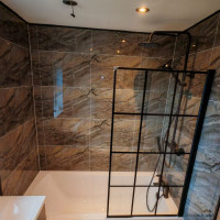 Brown marble shower tiles