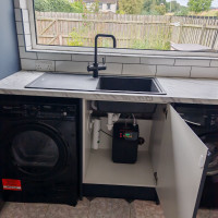 Water heater installed under sink